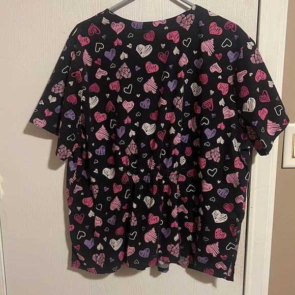 No longer wear scrubs. Brand is Sanibel scrubs. - Picture 2 of 2